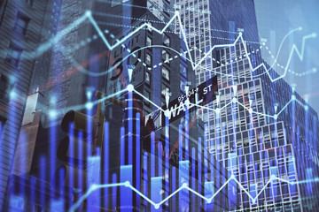Forex chart on cityscape with tall buildings background multi exposure. Financial research concept.
