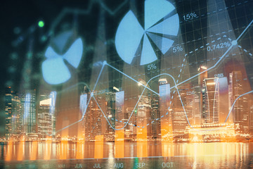 Financial chart on city scape with tall buildings background multi exposure. Analysis concept.