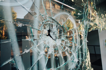 Shop window broken by riots in Chile - obrazy, fototapety, plakaty