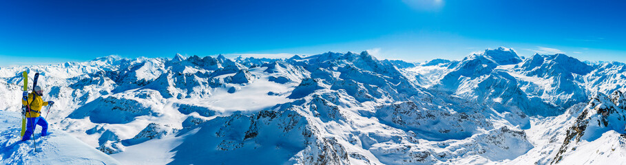 Fototapeta na wymiar Winter panorama landscape from Mont Fort and famous Matterhorn, Dent d'Herens, Dents de Bouquetins, Weisshorn; Tete Blanche in the background, Verbier, 4 Valleys,