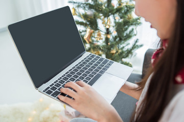 Fototapeta na wymiar LWTWL0008959 woman use Laptop computer in Christmas