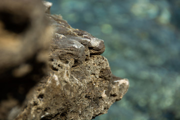 View of the rock with turquoise bokeh
