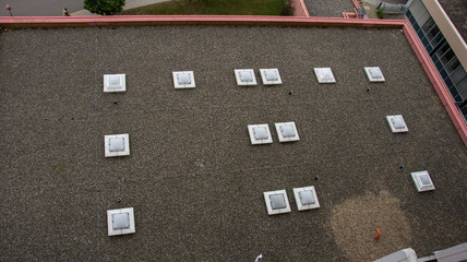 Fototapeta premium Aerial top view of industrial technical system machines on the rooftop in Germany, Pirmasens,, 2019