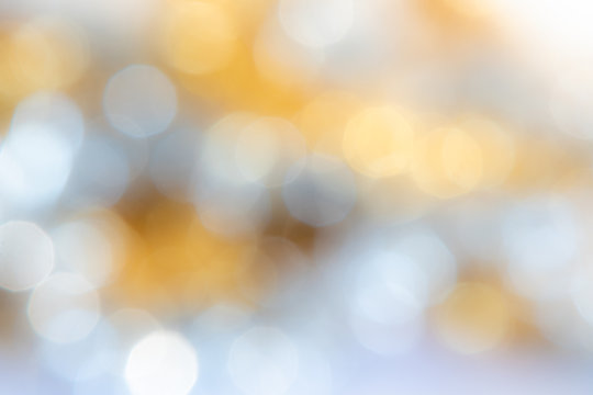 Gold and White Bokeh Background