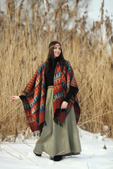 Fashion Lifestyle. Fashion Portrait of Beautiful Young Woman Outdoors. Soft warm vintage color tone. Artsy Bohemian Style.