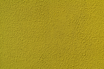 Golden yellow seamless venetian plaster background grunge stone texture. Traditional venetian plaster stone texture grain pattern drawing. Gold grunge texture. Golden seamless stone texture background