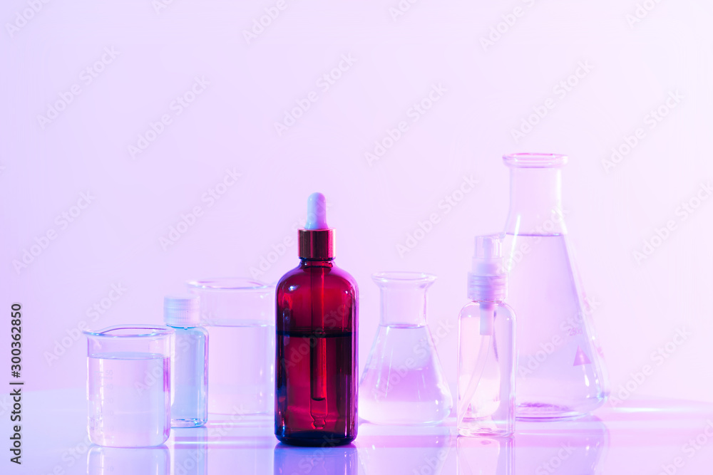Wall mural retro brown bottle with flask in science laboratory background