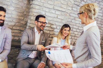 Job applicants having interview in modern office
