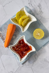 Homemade carrot jam with lemon, sugar and vanilla. Copy space