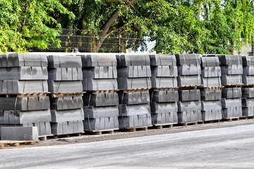 Curbstone on pallets for construction of road on the street