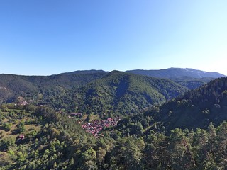 Obraz premium On the top of the city. Drone footage. Romanian mountains.