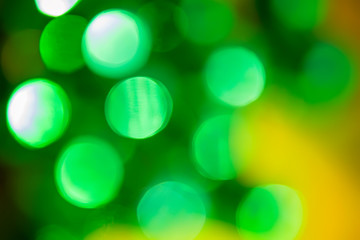 Abstract christmas new year bokeh lights green background