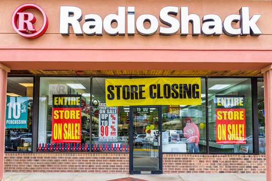 Burke, USA - May 12, 2017: Radio Shack store entrance facade with closing sale sign