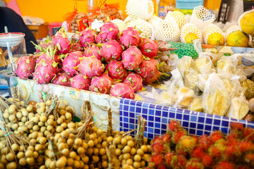 Traditional asian food market in Thailand, exotic fruits