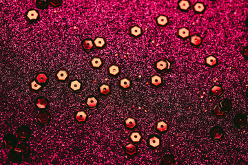 Abstract glittering background with sequins. Christmas or birthday backdrop. Party, holiday and festive concept.