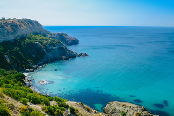 Fototapeta na wymiar Scenic seascape. Rocky cliffs and sea shore. Black sea, Crimea.