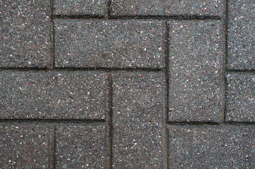 Texture of road tiles with herringbone pattern