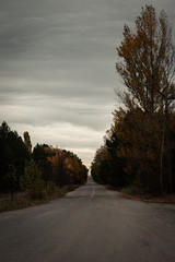 Empty streets in the Chernobyl exclusion zone near the ghost town of Pripyat and the Chernobyl nuclear reactor during autumn (Kiew, Ukraine, Europe)