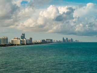 Fototapeta premium Aerial photo coastal condominiums in Miami Beach on the sea