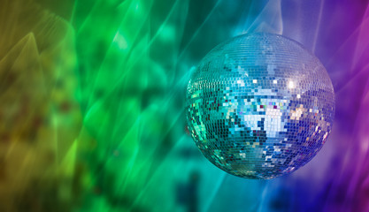 Party disco mirror ball reflecting colorful lights