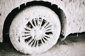 Passenger car at the sink in the foam