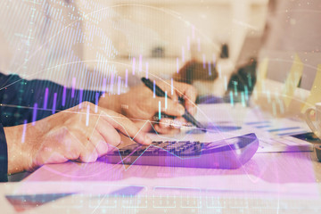 Obraz premium Financial trading graph multi exposure with man desktop background.