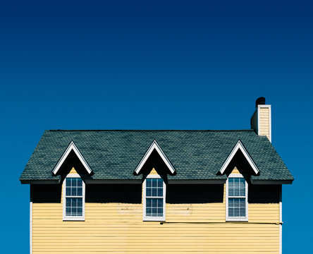 Exterior view of house against blue sky