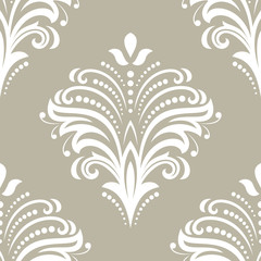 Floral vector ornament. Seamless abstract classic background with flowers. Pattern with repeating floral white elements. Ornament for fabric, wallpaper and packaging