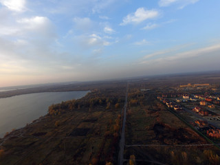 Aerial view of the saburb landscape at sunset. Dnepr river (drone image).  Near Kiev,Ukraine