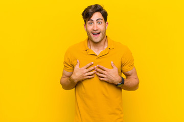  looking happy, surprised, proud and excited, pointing to self
