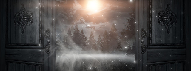 Open doors. Abstract bokeh light. Night view, magical atmosphere.