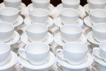 A lot of white cups for coffee. Catering.