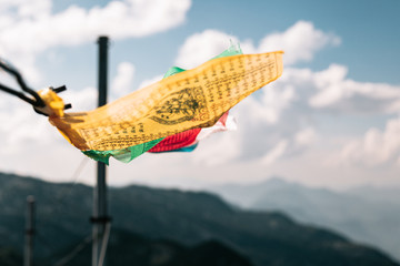 Obraz na płótnie Canvas Tibetan flags in the summit of Untersberg mountain, Austria