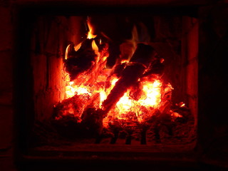 Fire warm in a fireplace in autumn