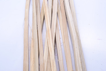 raw weave rattan on white acrylic sheet stock photo