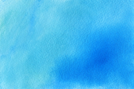 Abstract blue, turquoise watercolor textured background on a white isolated background