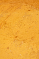 Yellow orange red ochre sand texture background isolated from national park Roussillion, Luberon, France on a summer holiday