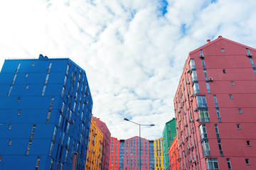 Complex of multi-storey colorful houses in the town