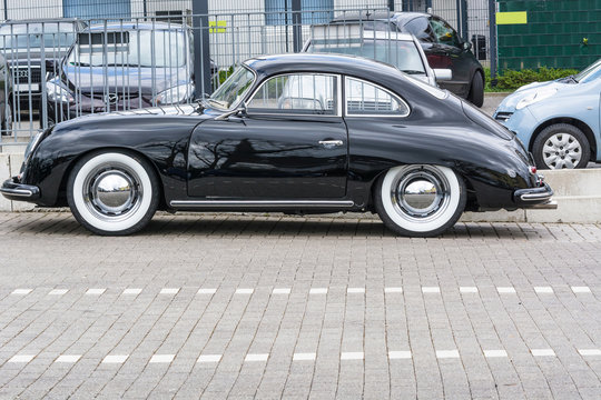 VELBERT, NRW, GERMANY - APRIL 06, 2016: Black Vintage Porsche 1600 With Whitewall Tires On A Car Park In Velbert City Center, Germany.