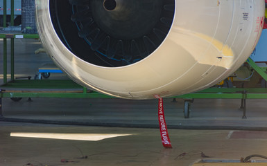 Close-up of a turbofan jet engine in modern airplane.
