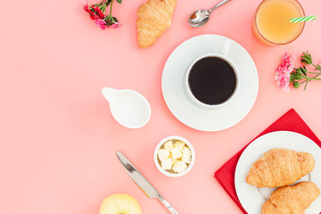 Morning breakfast coffee and croissant, butter, orange juice and