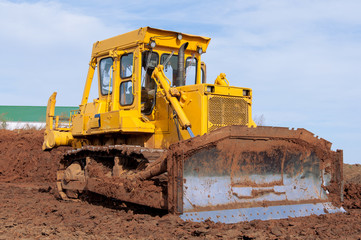 Large construction bulldozer at a construction site.