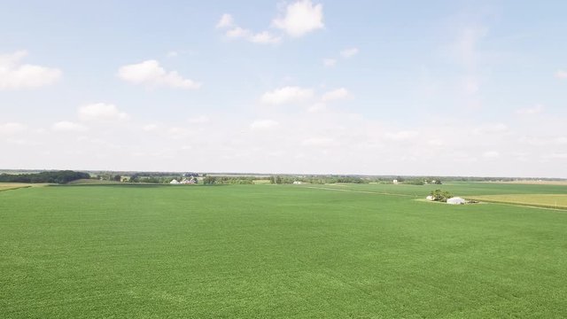 Open farmland in Illinois, pan right aerial