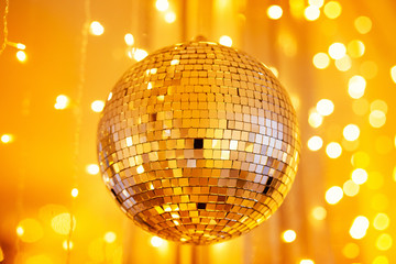 Disco ball for party for new year, golden mood color glow, flicker. Christmas day concept