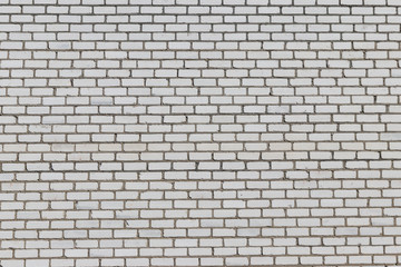 Fototapeta premium Texture of a white brick wall for background