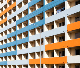 Bright, interesting facade of a residential building in Belarus. Industrial skyline. Windows Pattern. Industrial background.
