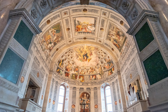 Beautiful classical paintings on dome interior of catholic church in Verona