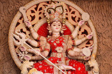 Idol of Goddess Devi Durga at a decorated puja pandal in Kolkata, West Bengal, India. Durga Puja is...