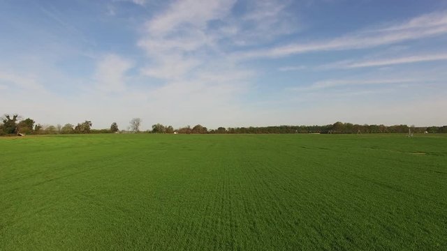 Wide aerial, green field in Virginia