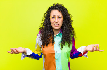 young pretty woman feeling clueless and confused, not sure which choice or option to pick,...